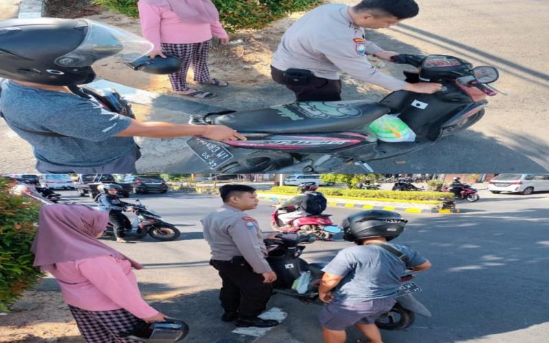 Bhabinkamtibmas Polsek Kampung Melayu Bantu Warga yang Sepeda Motornya Mogok