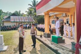 Bhabin Pino Jadi Komandan dan Paup pada Upacara HUT RI ke - 78 di Kecamatan Ulu Manna