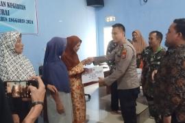 Kapolsek Ketahun Hadiri Penyaluran BLT DD di Desa Urai