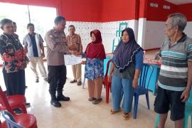 Kanit Binmas Polsek Ketahun Hadiri Penyaluran BLT DD di Desa Melati Harjo