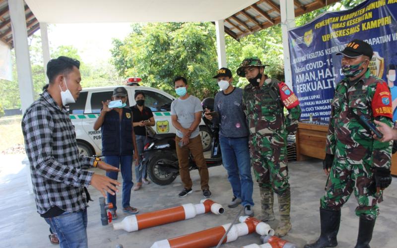 Personel TMMD Dampingi Penerimaan RPS di Kelurahan Kampuri