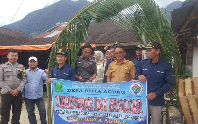 Bhabinkamtibmas Polsek Lebong Utara Hadiri Monitoring dan Evaluasi Penggunaan Dana Desa