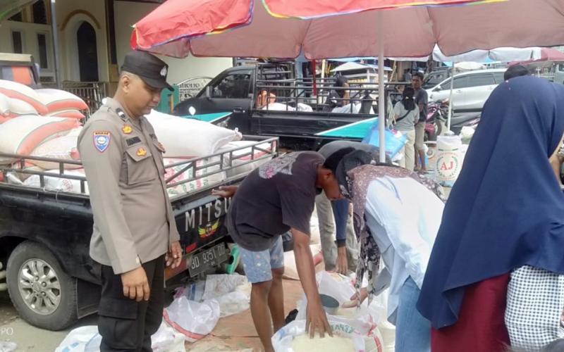 Sambangi Pedagang Beras, Bhabinkamtibmas Polsek Ketahun Berikan Imbauan Kamtibmas