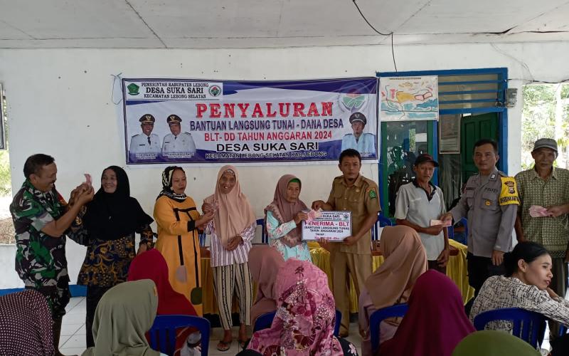 Bhabinkamtibmas Polsek Lebong Selatan Hadiri Penyaluran BLT DD di Desa Sukasari