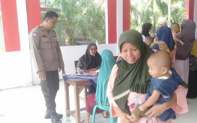 Cegah Stunting, Bhabinkamtibmas Laksanakan Kegiatan Pendampingan Posyandu Balita