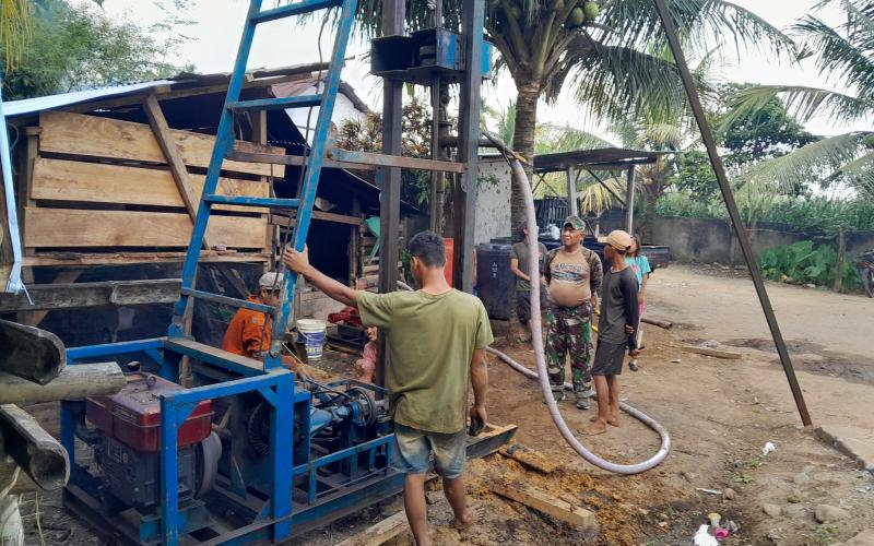 Satgas TMMD Ke-124 Kodim 0408/BS Lakukan Pengeboran di Titik Sumur Bor