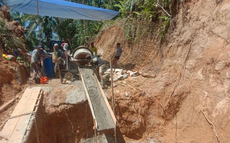 Pembangunan Jembatan Gantung Perintis Garuda di Desa Kuala Langi 