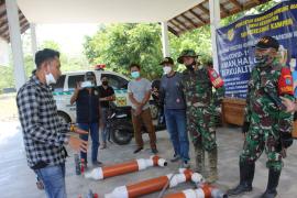 Personel TMMD Dampingi Penerimaan RPS di Kelurahan Kampuri