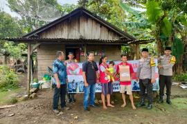 Polsek PUT Kembali Bagikan Bansos