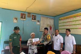 Bhabinkamtibmas Polsek Lais Hadir Dan Monitoring Penyaluran BLT- DD