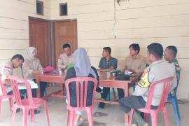 Peran Aktif Bhabinkamtibmas Hadiri Rapat Pleno Terbuka Dikantor Desa
