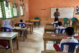 Police Goes To School, Polsek Muara Sahung Memberikan Sosialisasi dan Penyuluhan Bahaya Merokok 