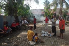 Bhabinkamtibmas Polsek Teluk Segara Monitoring Persiapan Lahan untuk Berkurban