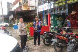 Bhabinkamtibmas Polsek Kota Manna Berikan Imbauan Kepada Petugas Parkir 