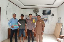 Babinkamtibmas Polsek Seginim Monitoring Penyaluran BLT DD Tahap 7 di Desa Kebanjati 