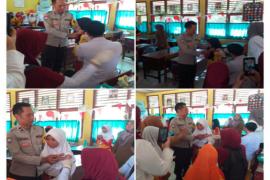 Sambangi SDN 103, Bhabinkamtibmas Polsek Muara Bangkahulu Monitoring Pelaksanaan Campak 
