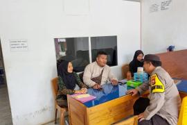 Sambangi Warga, Bhabinkatibmas Ajak Masyarakat untuk Bekerjasama Menjaga Harkamtibmas