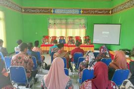 Bhabinkamtibmas Polsek Ketahun Hadiri Rakor Lintas Sektoral Tentang Kesehatan Masyarakat Desa