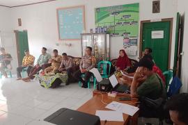 Bhabinkamtibmas Polsek Padang Jaya Hadiri Sertifikasi Pembangunan Fisik Desa Tanah Tinggi