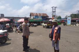 Polsek Ketahun Berikan Himbauan Kamtibmas Kepada Jukir Pasar Agar Selalu Waspada Kriminal