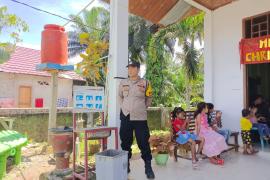 Personel Polsek Air Besi Amankan Ibadah Minggu Umat Kristiani di Gereja Gekisia Jemaat Ebenhaezer