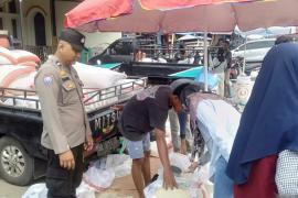 Sambangi Pedagang Beras, Bhabinkamtibmas Polsek Ketahun Berikan Imbauan Kamtibmas