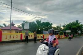 Piket SPKT Melaksanakan Commander Wish di Depan Mako Polsek Ketahun