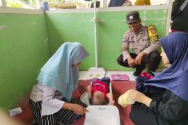 Wujud Kehadiran Polisi, Bhabinkamtibmas Polsek Ketahun Datangi Kegiatan Posyandu Balita