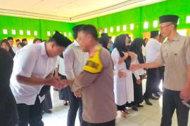 Kanit Intelkam Beserta Bhabinkamtibmas Polsek Kaur Selatan, Hadiri Pelantikan PTPS Se-Kecamatan Kaur Selatan