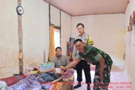 Bhabinkamtibmas Polsek Maje  Hadiri Penyaluran BLT DD Tahap 1 Tahun 2024 Desa Bakal Makmur 