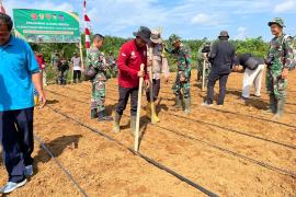 Sinergitas TNI Polri pada TMMD di Desa Bukit Tinggi
