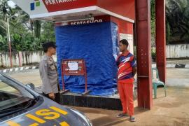 Personel Polsek Padang Jaya Patroli Dialogis Pengecekan Stok BBM di Pertashop