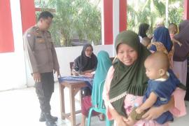 Cegah Stunting, Bhabinkamtibmas Laksanakan Kegiatan Pendampingan Posyandu Balita