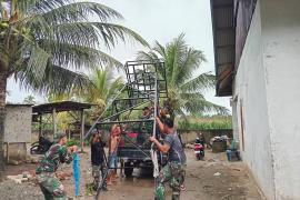 Semangat Gotong Royong Warga Bangun Tower Air Bersama Satgas TMMD Ke-124 Kodim 0408/BS