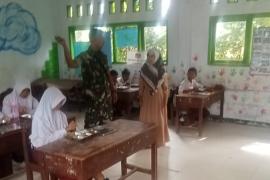 Satgas TMMD Ke-124 Kodim 0408/BS Gelar Komsos di Sekolah