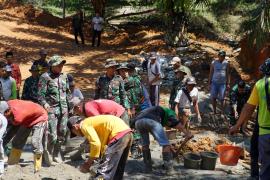 Kerja sama Satgas TMMD Ke-124 Kodim 040BS Dengan Masyarakat
