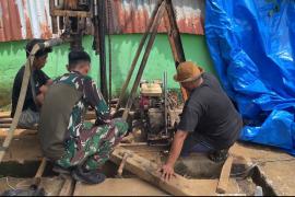 Setetes Air Kehidupan: TMMD ke-126 Kodim 0423/BU Hadirkan Sumur Bor di Desa Batu Raja R