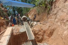 Pembangunan Jembatan Gantung Perintis Garuda di Desa Kuala Langi 