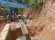 Pembangunan Jembatan Gantung Perintis Garuda di Desa Kuala Langi 